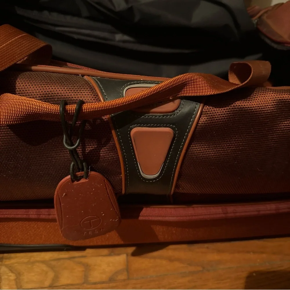 Tumi Rolling Garment Bag in Burnt Orange